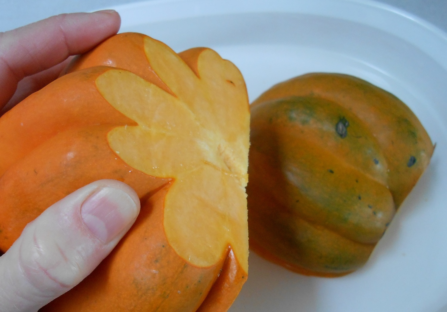 half an acorn squash with stem removed