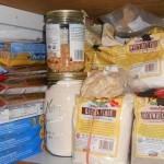 a cabinet full of grain-based foods