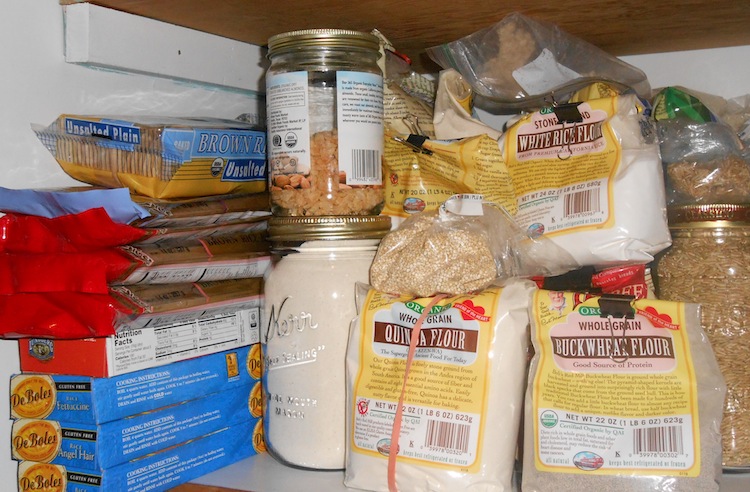 a cabinet full of grain-based foods