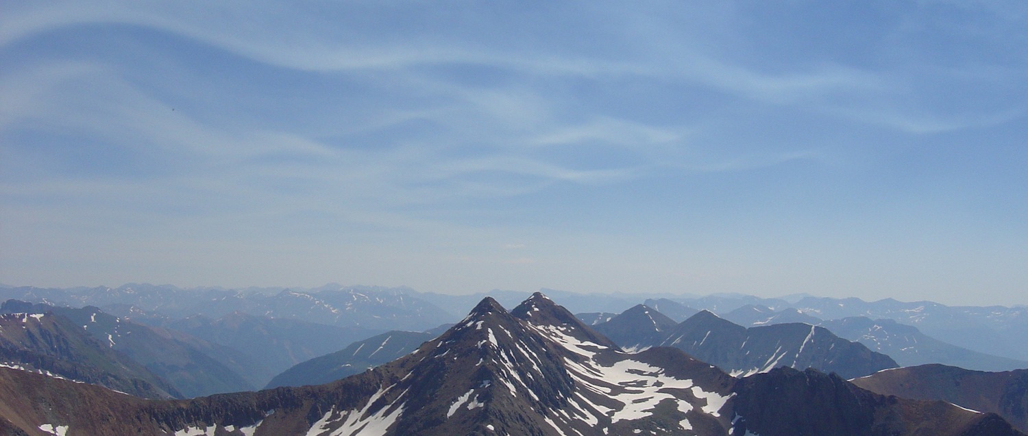 a mountain view with sky